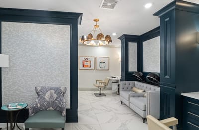 A modern beauty salon interior with stylish seating