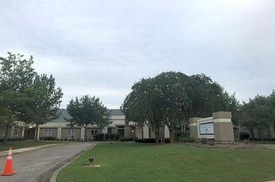 Exterior view of The Cedars assisted living facility