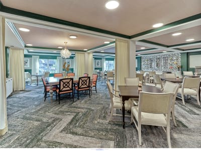 Bright common area with tables and seating