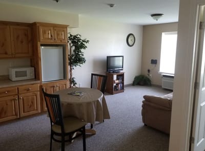 Cozy resident room with kitchen area and living space