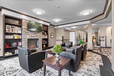 Interior common area with seating and fireplace