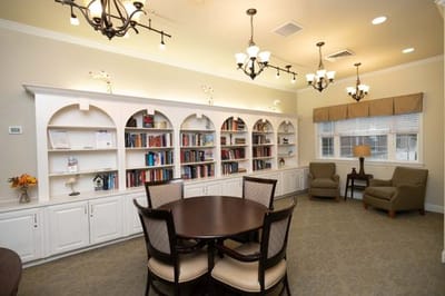 Interior common area with bookshelves and seating
