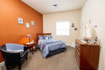 Bright and cozy resident bedroom in a senior living facility