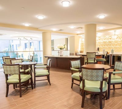 Interior view of a common area with dining tables