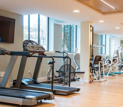 Well-equipped fitness room with exercise equipment