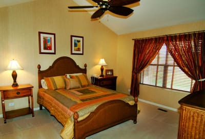 Cozy bedroom interior with wooden furniture