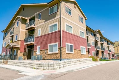 Exterior view of a multi-story senior living building
