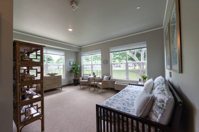 Bright and airy resident room with seating area