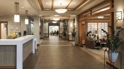 Bright interior of the facility with residents relaxing