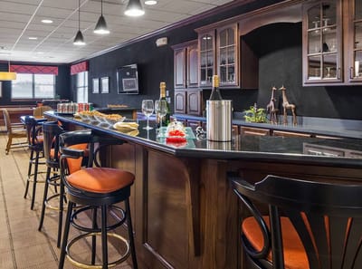 Interior bar area with seating and food display