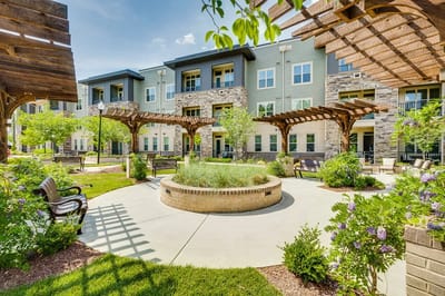 Beautiful outdoor courtyard with seating and greenery
