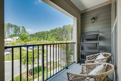 View from a balcony overlooking landscaped grounds