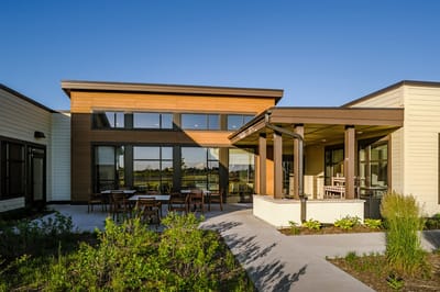 Exterior view of The Summit at Bettendorf with outdoor seating