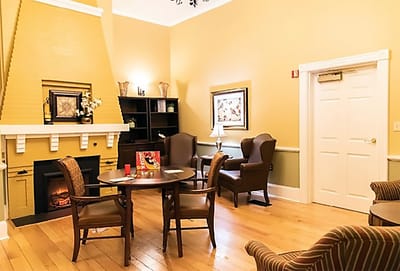 Common area with seating and fireplace