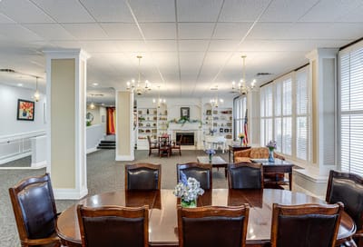 Interior view of a common area with dining tables