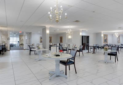 Bright dining room with tables and chairs
