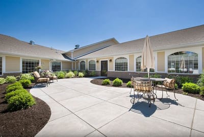 Outdoor courtyard with seating and landscaping
