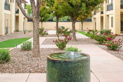 View of a landscaped courtyard with trees and flowers