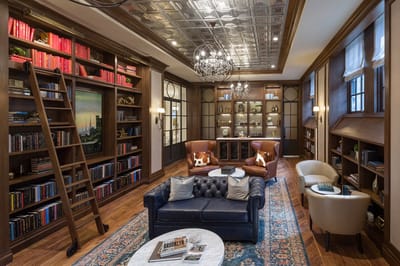 Cozy library with bookshelves and seating