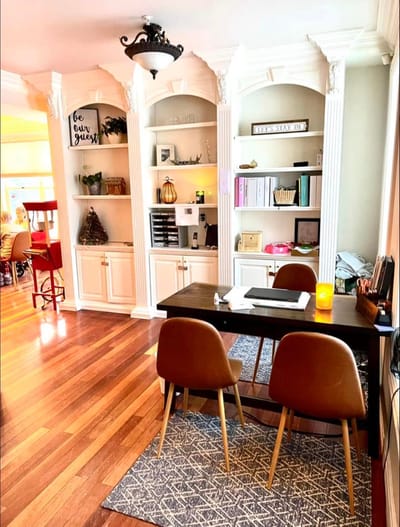 Cozy common area with chairs and desk