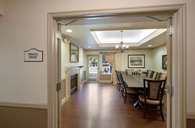 Interior view of a private dining room with a long table