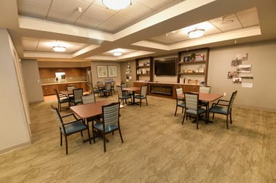 Bright interior common area with tables and chairs