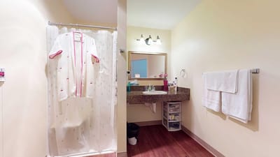 Bathroom area with sink and toiletries