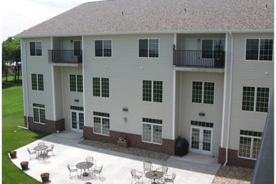 Exterior view of the Washington Crossing facility with outdoor seating