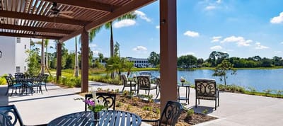 Outdoor seating area overlooking a lake