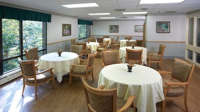 Bright dining room with tables and chairs