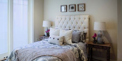Cozy bedroom with a floral theme and decorative pillows