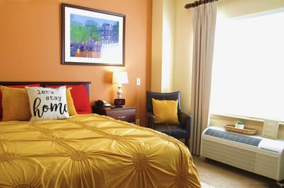 Cozy private room with a warm color scheme