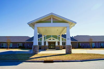 Exterior view of a senior living facility with entrance