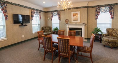 Cozy common area with seating and a fireplace