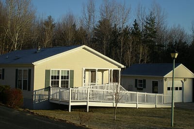 Exterior view of a light-colored facility building