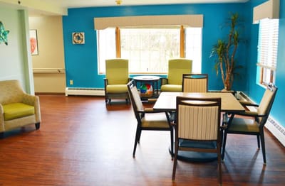 Bright common area with seating and natural light