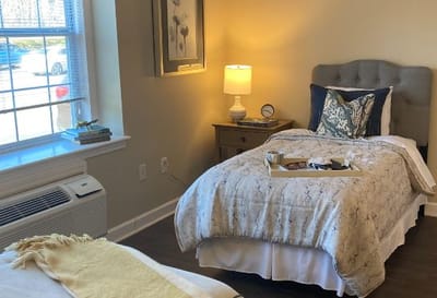 Cozy private resident room with warm lighting