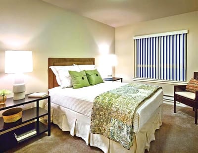 Brightly decorated bedroom in a senior living facility