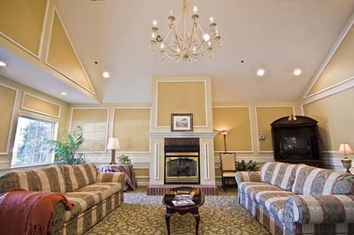 Cozy common area with seating and fireplace
