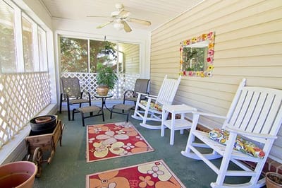 Bright interior seating area with rocking chairs