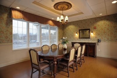 Dining room with a large table and elegant decor
