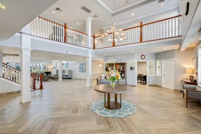 Bright and welcoming lobby area with seating and decorations