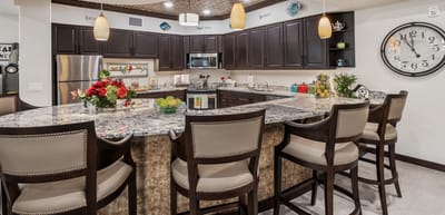 Well-designed kitchen space with seating and decor