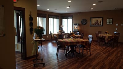 Common area with dining tables and decor
