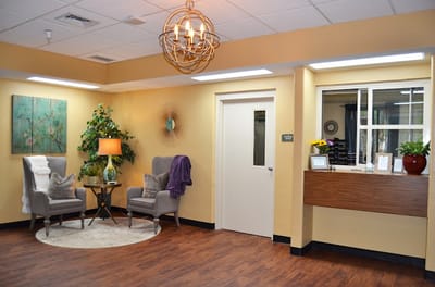 Bright interior common area with seating and decor