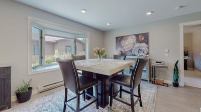 Bright and modern dining area with floral decor