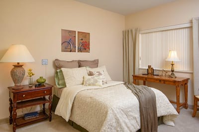 A cozy bedroom with soft lighting and decor