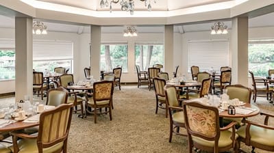 Bright dining room set with tables and chairs