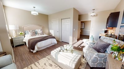 A cozy resident room with stylish furnishings