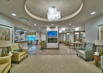 Maplewood Park Place, Nursing Home in Bethesda, MD — Modern common area with seating and wall-mounted TV
